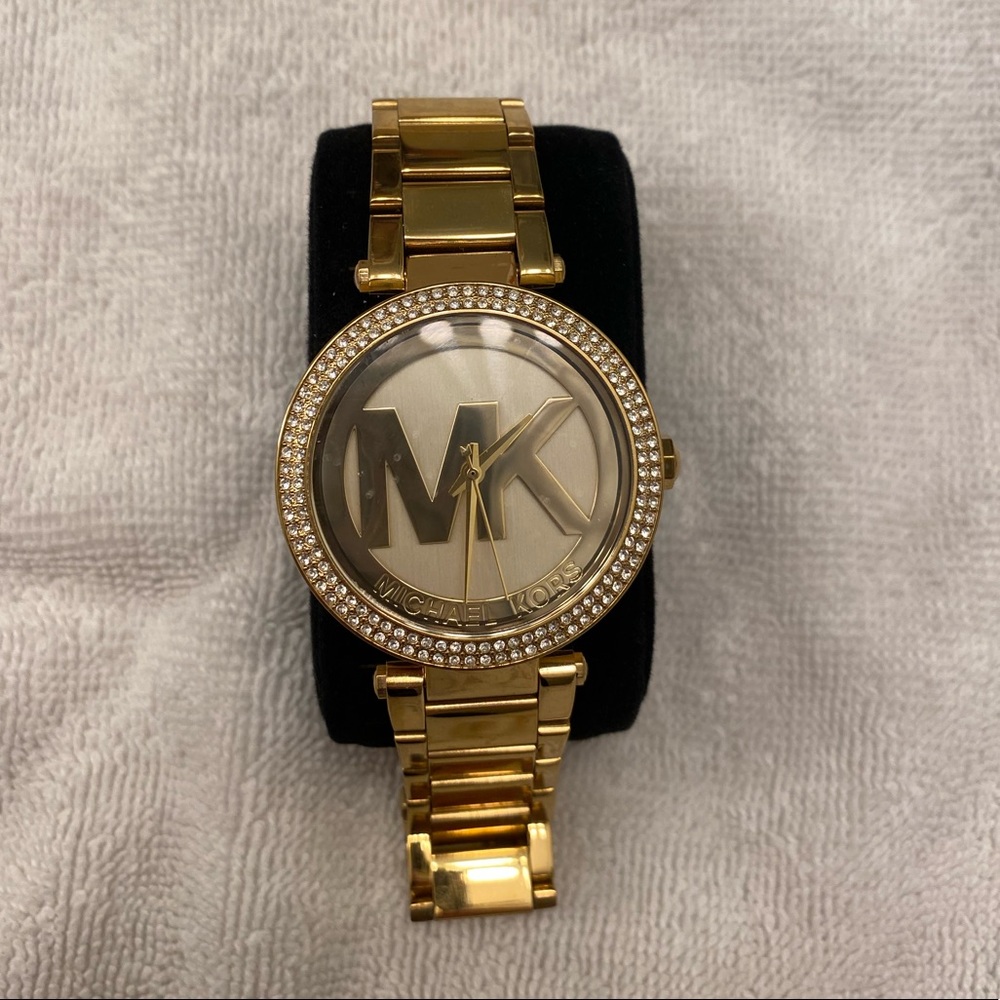 Womans gold Michael kors watch
